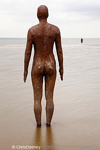 Iron Man statue by Antony Gormley, Another Place, Crosby beach, UK